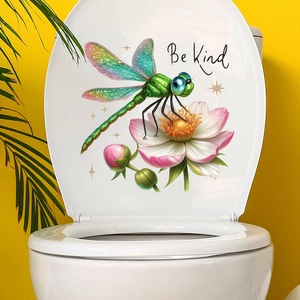 Detail of waterproof dragonfly and flower sticker on white toilet lid with Be Kind text