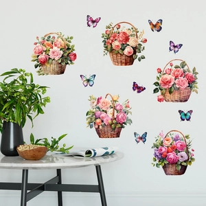 Detail of self-adhesive wall decals with rose flower baskets and colorful butterflies
