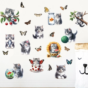 Waterproof self-adhesive wall decals featuring gray cartoon cats and colorful butterflies