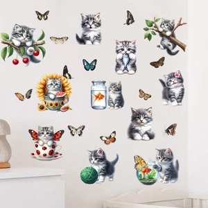 Detail of waterproof wall stickers featuring gray kittens, butterflies, and sunflowers