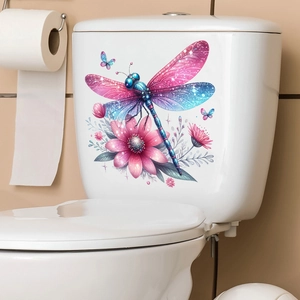 Detail of waterproof 3D dragonfly and flower sticker on a white ceramic toilet tank