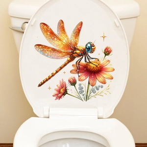 Detail of waterproof dragonfly and flower sticker on a white toilet lid surface