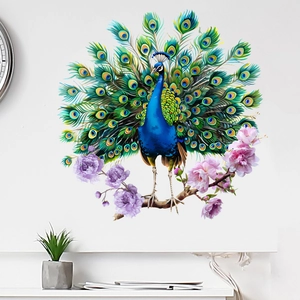 Vibrant peacock wall sticker with floral accents applied on a modern minimalist white wall