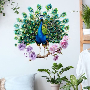 Detailed blue peacock wall decal with pink flowers displayed in a bright living room