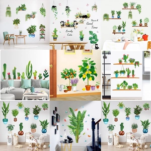 Close-up of 3D green plant wall stickers and cartoon cats for living room decor