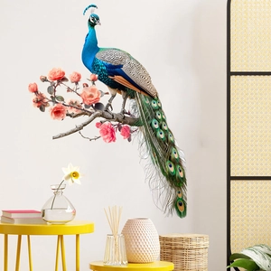 Detail of vibrant blue peacock and pink blossoms on a self-adhesive wall decal sticker