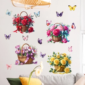 Detailed view of floral wall stickers with butterflies on a living room wall