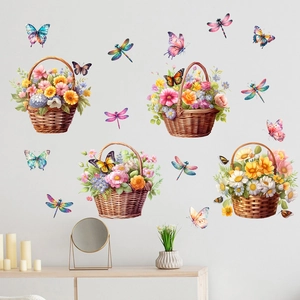 Detailed view of watercolor flower basket wall stickers with butterflies on a white wall