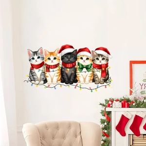 Detail of Christmas cat wall stickers featuring five kittens with hats and festive lights