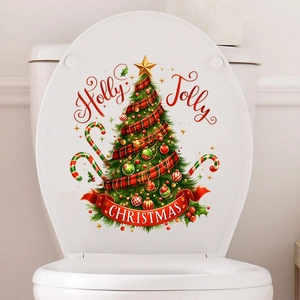 Dettaglio dell'adesivo con ghirlanda di Natale Holly Jolly su coperchio del water bianco