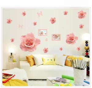 Detail of pink rose wall stickers and butterflies used as home living room decor