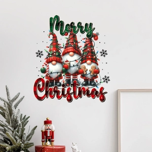 Christmas wall decal with three festive gnomes and Merry Christmas text on a white wall