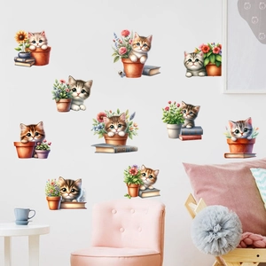 Adhesive wall stickers featuring cute cats with potted plants and sunflowers for home decor