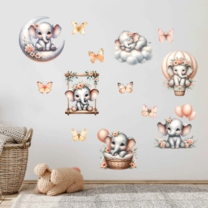 Nursery wall stickers featuring watercolor elephants swinging and floating with balloons