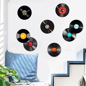 Close-up of retro vinyl record wall stickers and clock set for living room decor