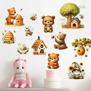 Cartoon honey bee and bear wall stickers for nursery decor in warm yellow tones