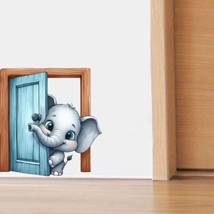 Detail of 3D cartoon elephant wall sticker appearing behind a blue door on a white wall