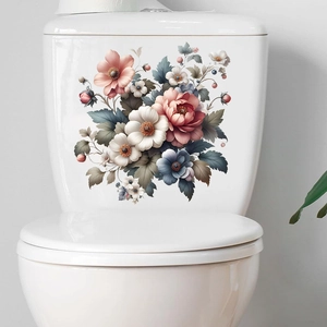 Close-up of waterproof floral stickers with pink and blue peonies on white ceramic surface