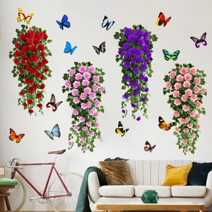 Détail de stickers muraux avec des vignes de roses colorées et papillons volants