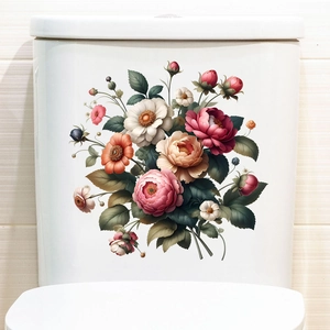 Detail view of vintage peony flower decals applied to a white ceramic toilet tank
