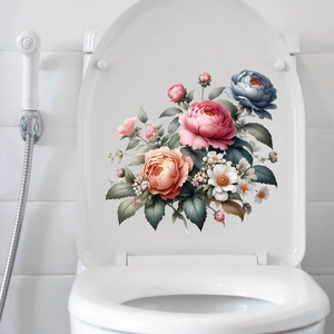 Detail of floral toilet seat sticker with pink roses and blue peonies on a white surface