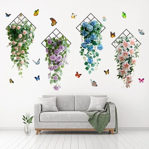 Close-up of floral wall decals featuring hanging baskets and colorful 3D butterflies