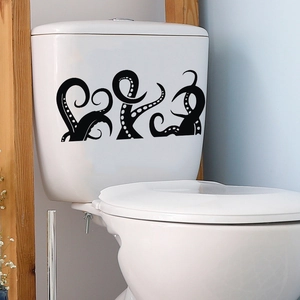 Waterproof black octopus tentacle stickers applied on a white toilet tank surface