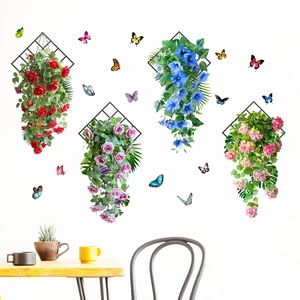 Detail of floral wall decals featuring colorful roses and butterflies with black diamond frames
