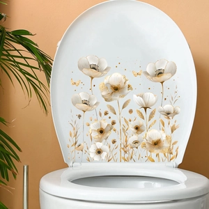 Detail of elegant gold and white floral butterfly waterproof stickers on a toilet lid