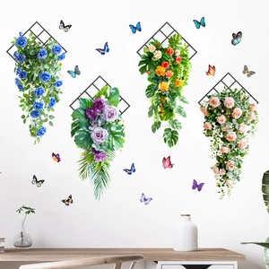 Close-up of colorful artificial flower wall decor on black diamond metal grids
