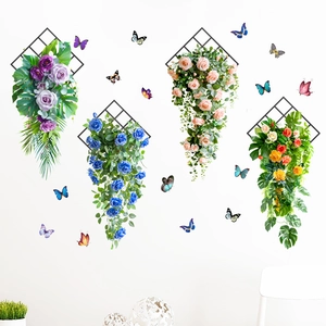 Detail of floral wall stickers with butterflies on black diamond metal grids for home decor