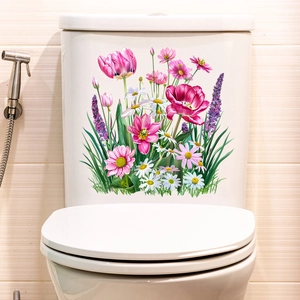 Waterproof tulip and lavender floral stickers applied on a white ceramic toilet tank