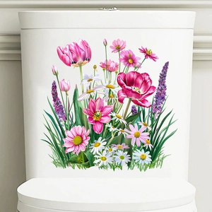 Close-up of pink tulips and daisy waterproof stickers applied to a ceramic toilet tank