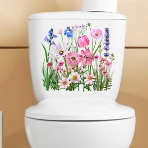 Detail of colorful floral stickers showing pink cosmos and lavender on a white toilet tank