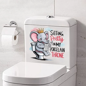Funny cartoon elephant reading newspaper sticker on a white modern toilet tank cover