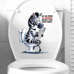 Funny zebra reading newspaper waterproof decal on a white ceramic toilet lid
