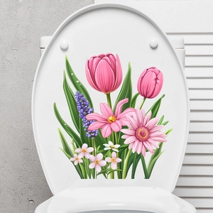Detailed view of pink tulip and daisy floral waterproof stickers on a white toilet lid