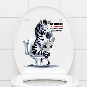 Funny zebra reading newspaper toilet sticker with humorous text on clean white lid