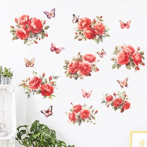 Detail of DIY floral wall stickers with red peonies and butterflies in watercolor style