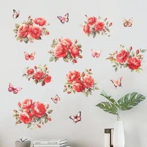 Macro detail of red peony and butterfly wall stickers on a minimalist grey living room wall
