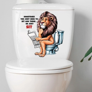 Funny lion reading newspaper toilet sticker with humorous text on a white tank