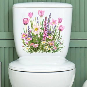 Detail of waterproof tulip and lavender floral stickers on a white toilet tank