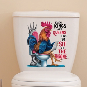 Close-up of a rooster reading a newspaper sticker applied on a white ceramic toilet tank