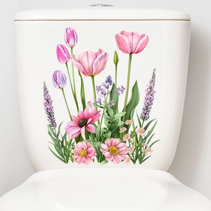 Detailed close-up of self-adhesive tulip and daisy floral wall stickers on a ceramic surface