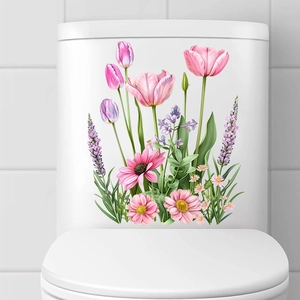 Detail view of colorful tulip and lavender floral decals on white ceramic toilet tank surface