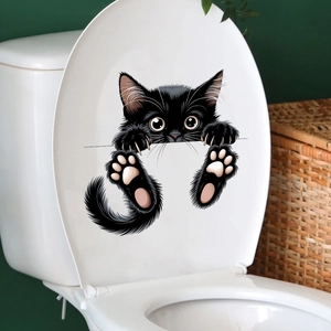 Close-up of waterproof black peeping cat wall sticker with vivid pink paw details
