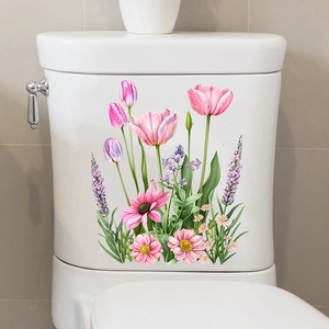 Vibrant pink tulip and dahlia floral waterproof stickers applied to a white toilet tank