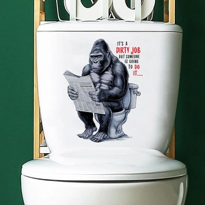 Close-up of funny gorilla reading newspaper waterproof sticker applied on white toilet tank