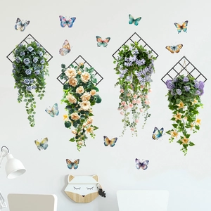 Detail of 3D rose flower vines and colorful butterfly wall stickers on black metal grids