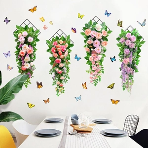 Detail view of 3D floral wall stickers with hanging rose vines and colorful butterflies
